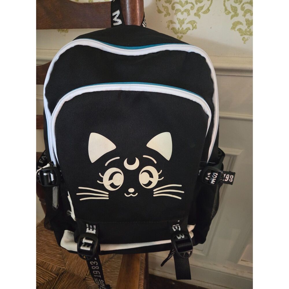 Sailor Moon with a cat face, anime, glow-in-the-dark, multiple pockets